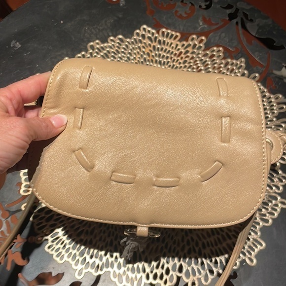 Lionel Designer Crossbody purse with fringe accent in camel color - Picture 6 of 8